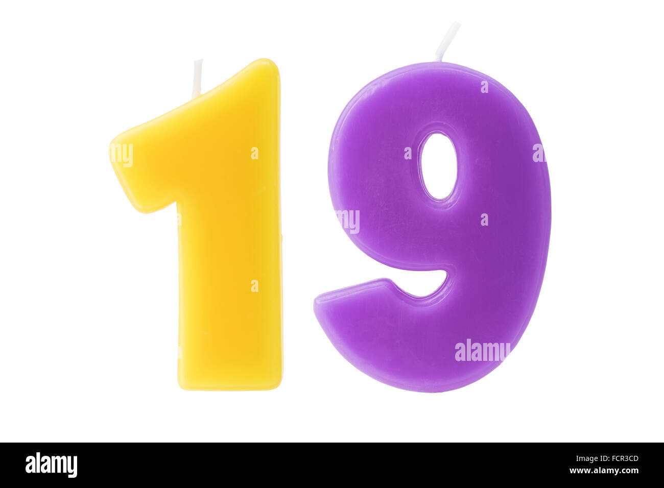 Bougies d'anniversaire colorée sous la forme du nombre dix-neuf sur fond blanc Banque D'Images