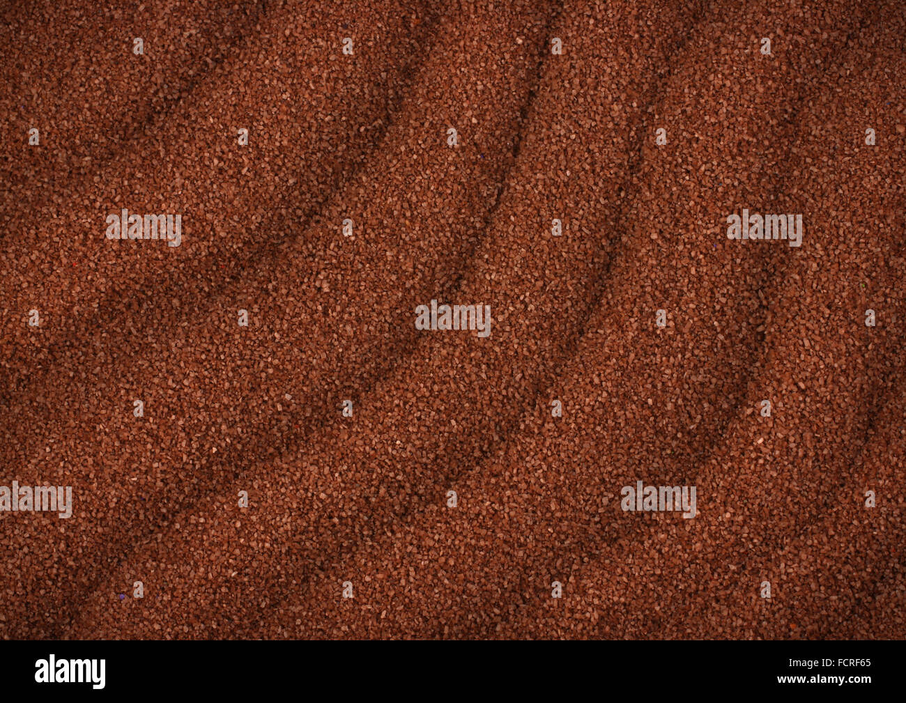 Vagues de sable brun comme arrière-plan, macro Banque D'Images