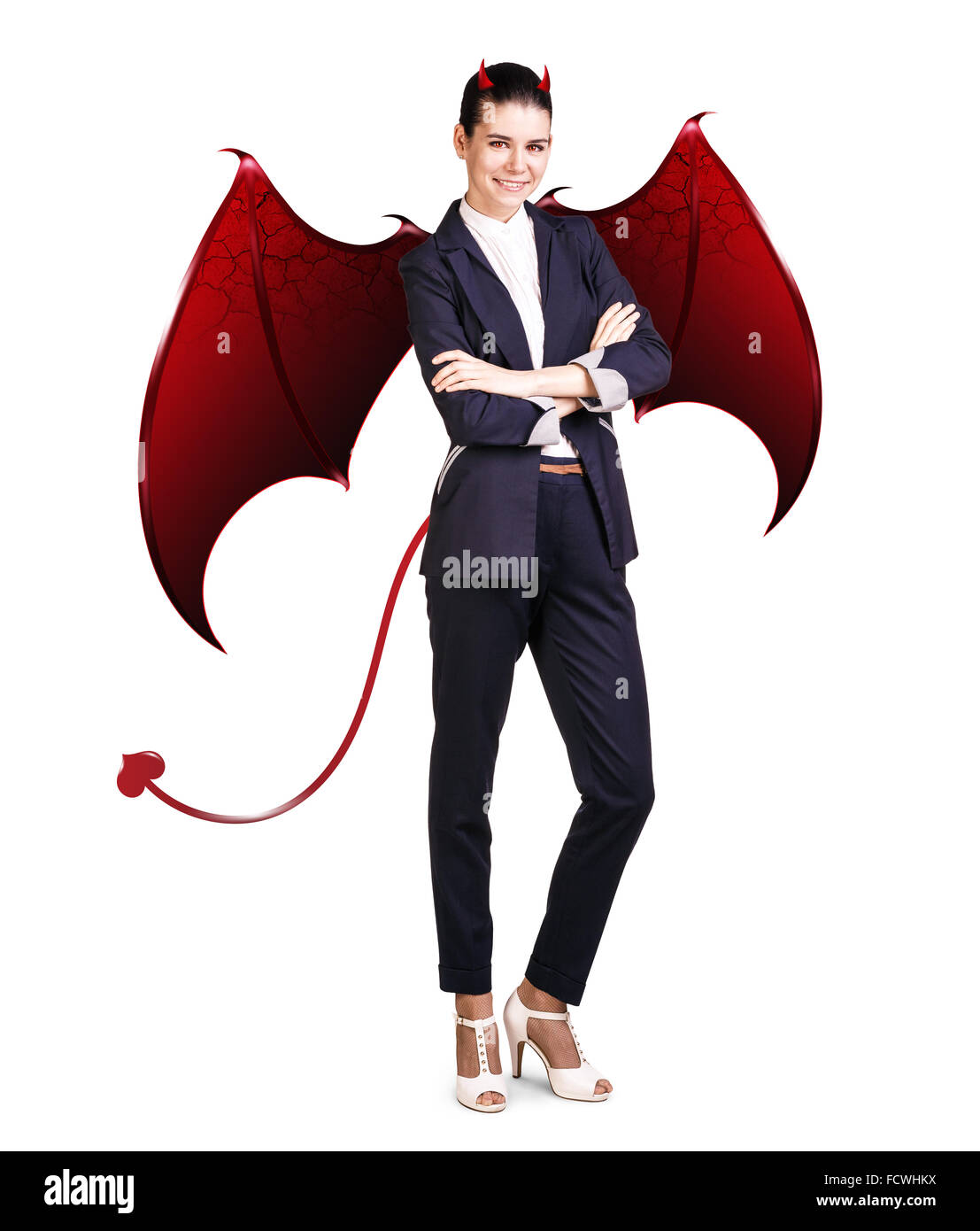 Femme d'affaires pleine longueur avec des ailes et des cornes du diable, isolated on white Banque D'Images