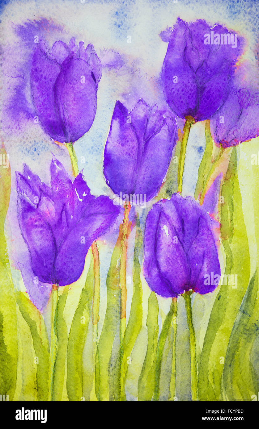 Bouquet de tulipes de couleur violette dans un champ. La technique de badigeonnage près des bords donne un effet de flou en raison de la modification de l'al. Banque D'Images