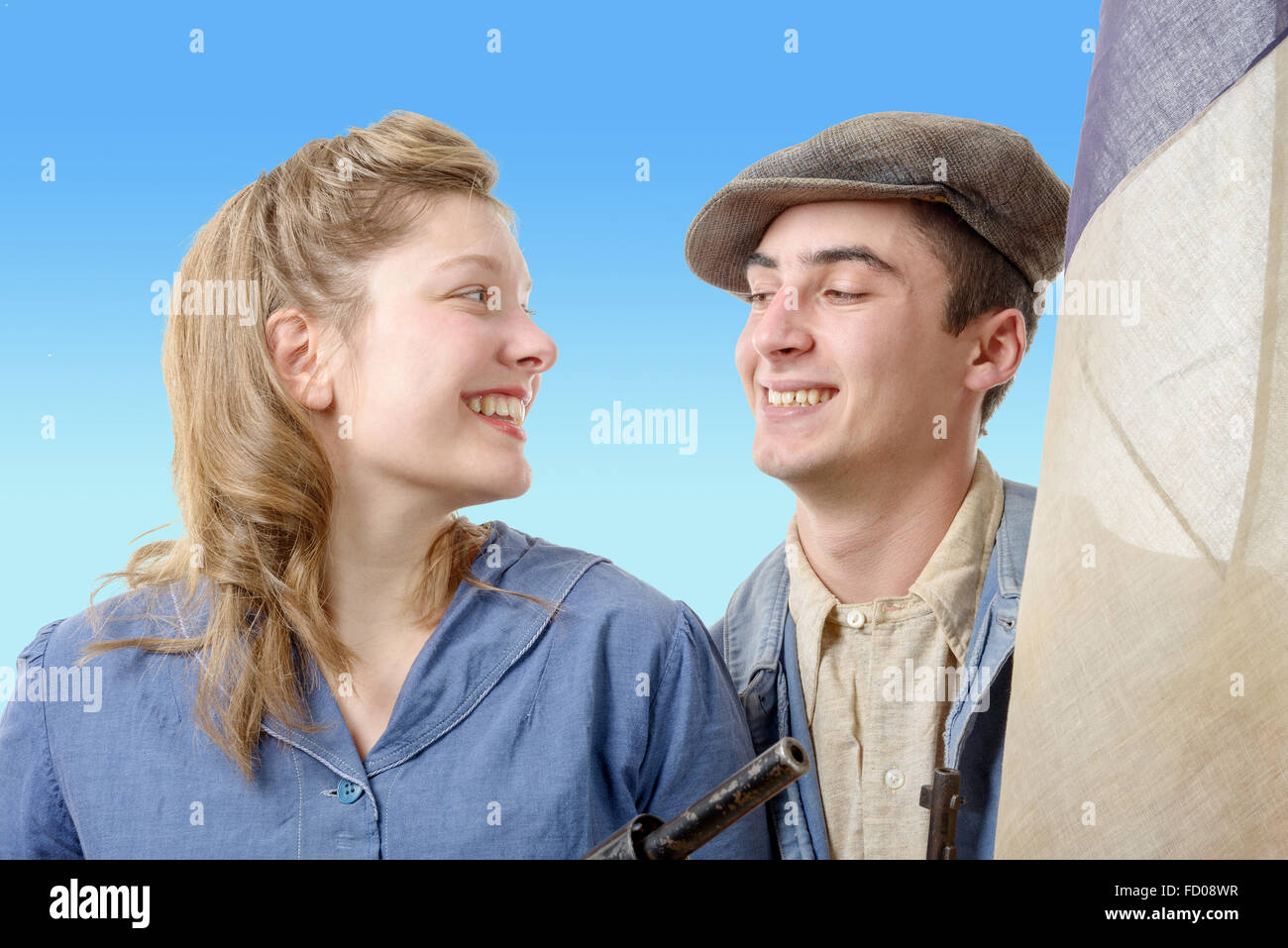 Un jeune travailleur des couples en vêtements vintage, 40s Banque D'Images