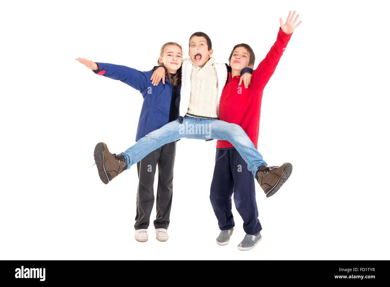 Groupe d'enfants isolés saut en blanc Banque D'Images