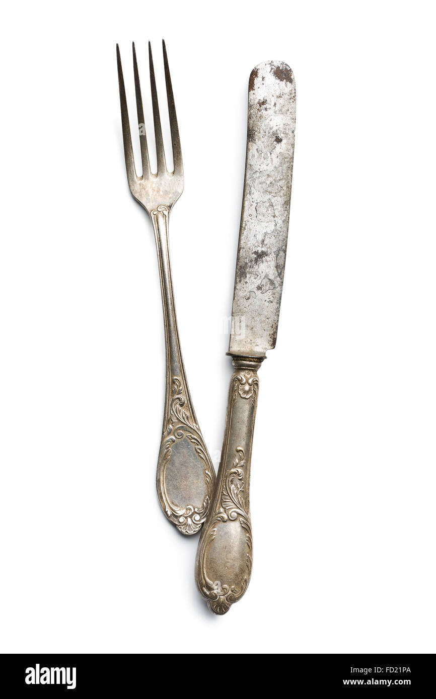 Old vintage couteau et fourchette sur fond blanc Photo Stock - Alamy