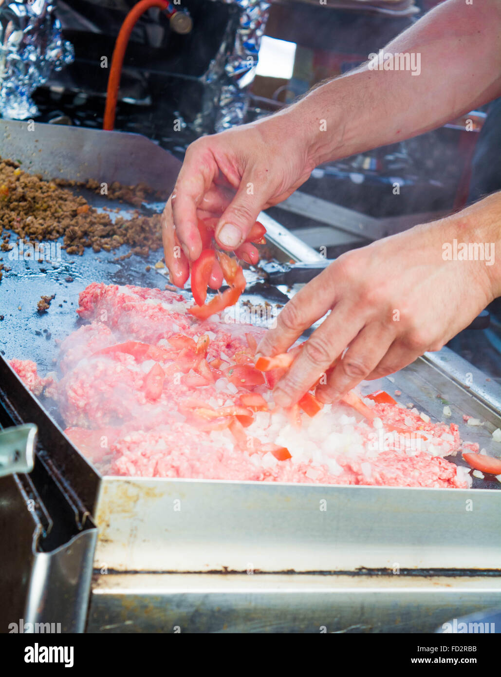 Close up de viande, poivrons et oignons par cuisson Banque D'Images