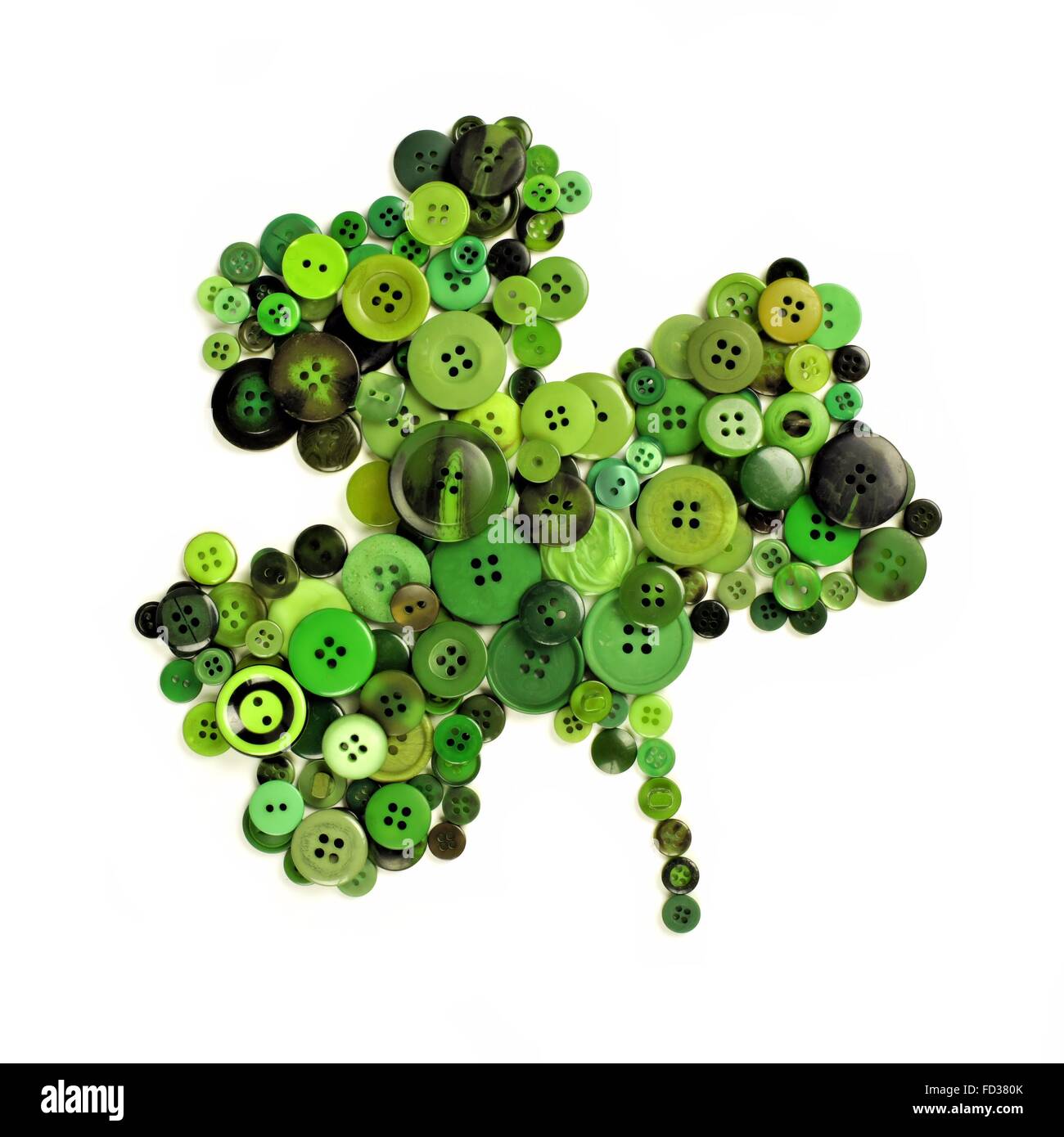 St Patricks Day shamrock de boutons verts sur fond blanc Banque D'Images