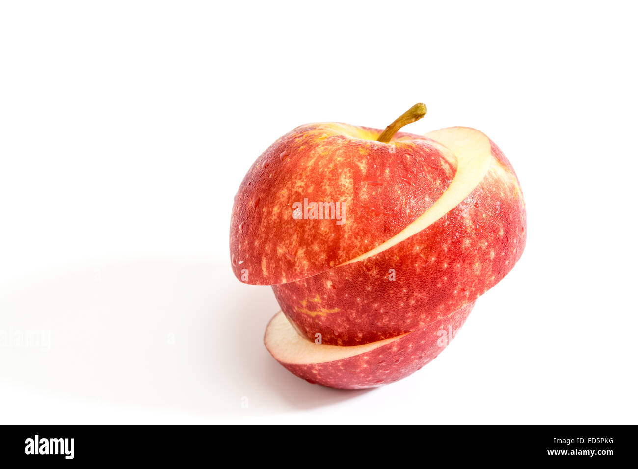Pomme rouge sur fond blanc. Banque D'Images