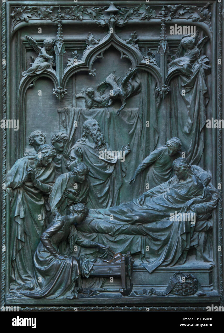 La Nativité de la Vierge Marie. Détail de la porte de bronze de la principale cathédrale de Milan (Duomo di Milano) à Milan, Italie. La porte de bronze a été conçu par le sculpteur italien Ludovico Pogliaghi en 1894-1908. Banque D'Images
