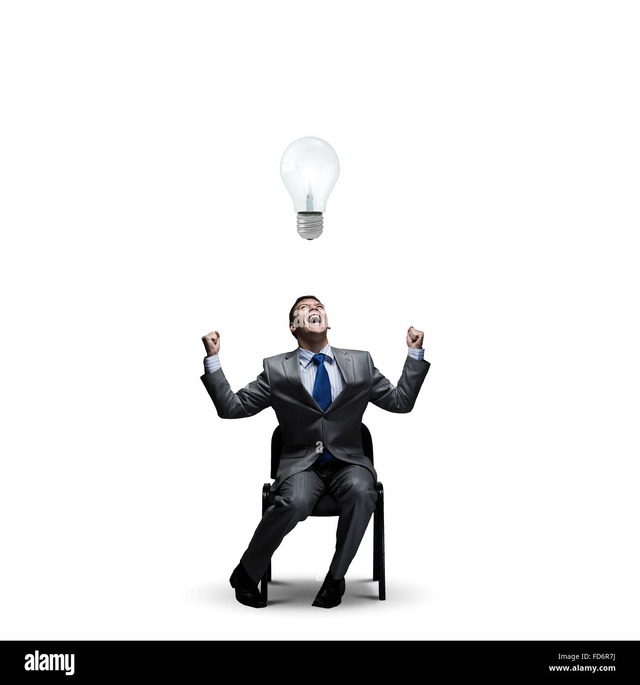 Homme d'affaires réussi crier joyeusement dans to Sky Banque D'Images