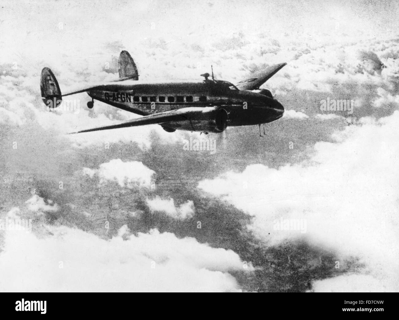 Carte de souhaits de Chamberlain avec Lockheed Electra, 1938 Super 14 Banque D'Images