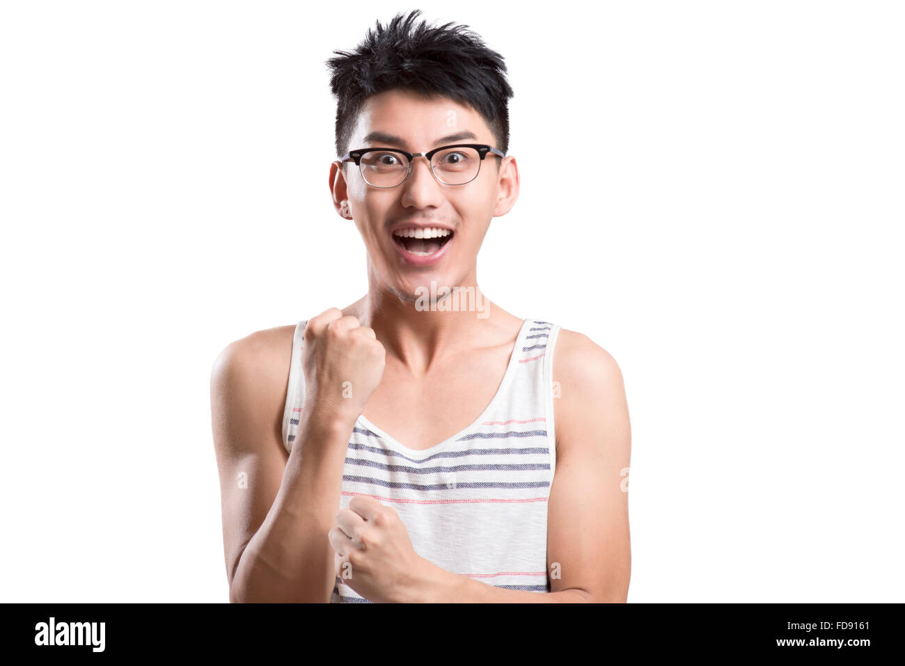 Portrait of young man cheering Banque D'Images