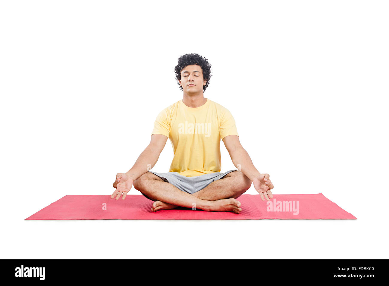 1 Jeune homme assis Padmasana Yoga Banque D'Images