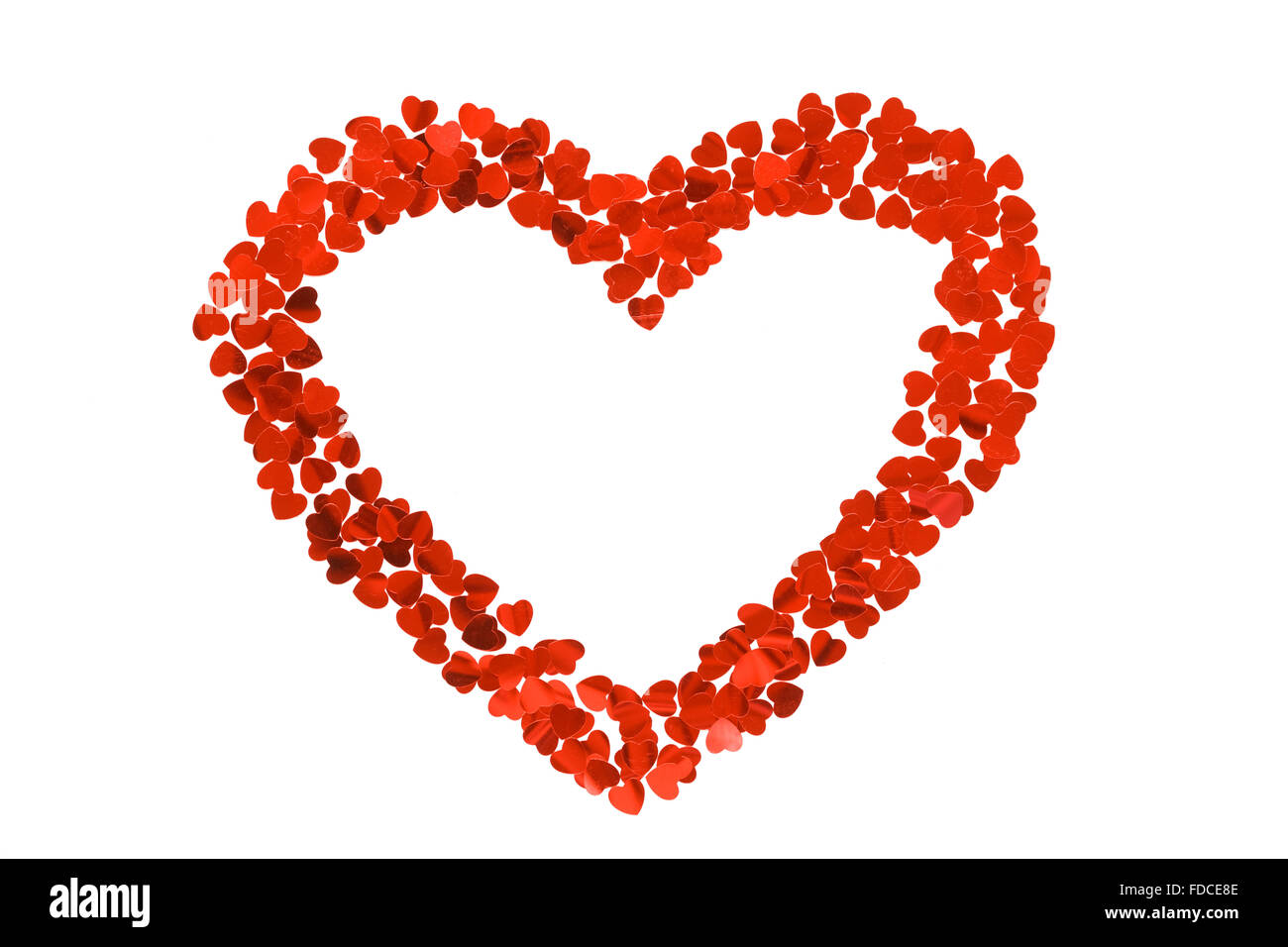 Confetti par cœur sous la forme de coeur. Isolé sur fond blanc. Banque D'Images