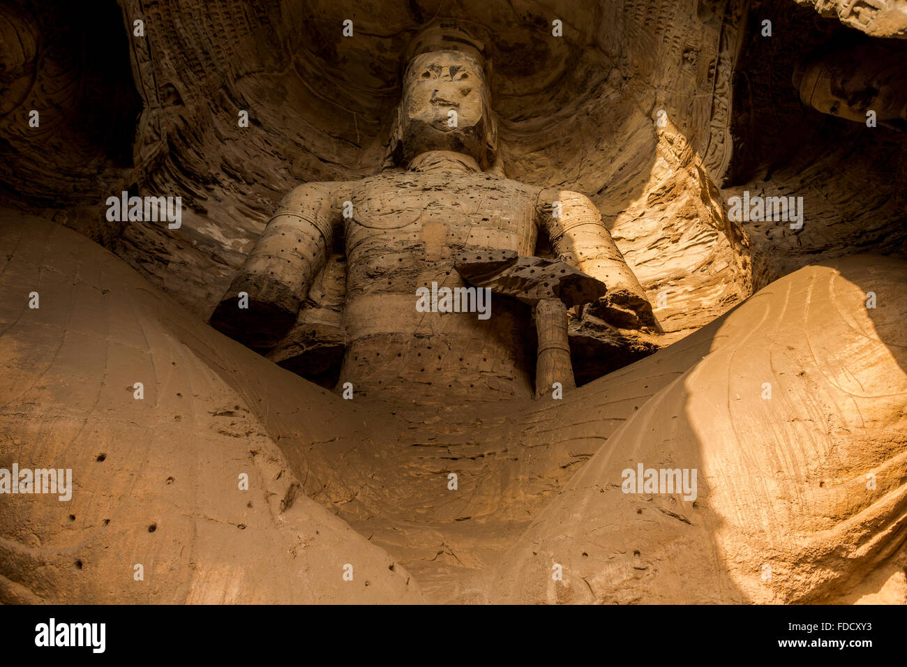 Ancienne statue de Bouddha en pierre, grottes de Yungang, à Datong, province de Shanxi, Chine Banque D'Images