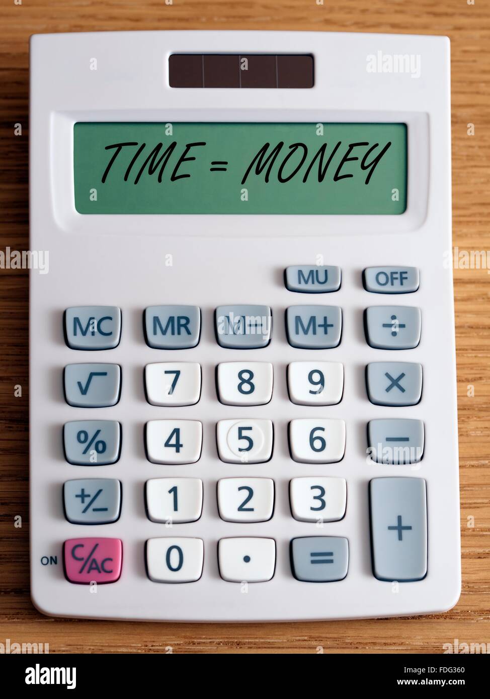 Temps  = argent sur une calculette. Banque D'Images