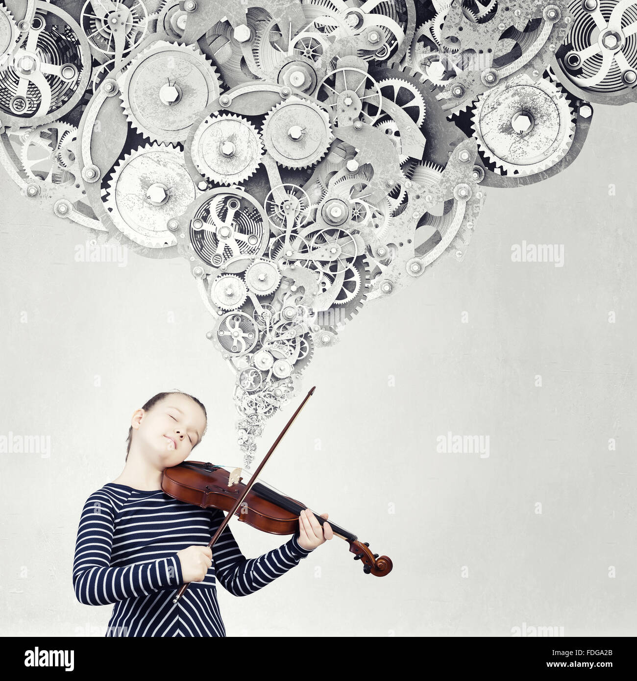 Cute kid girl playing violin et pignons flying out Banque D'Images