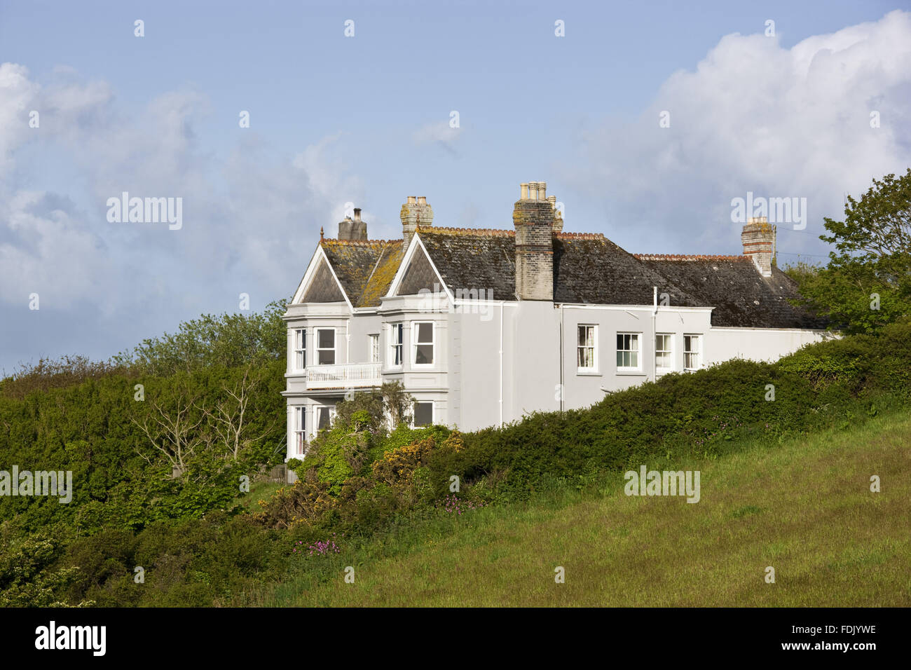 Broom Parc perché sur la falaise à Veryan, près de Truro, Cornwall, une fiducie nationale bed & breakfast création. C'était la maison qui sert à l'emplacement de Cornouailles pour le tv drama "La Pelouse de Camomille". Banque D'Images