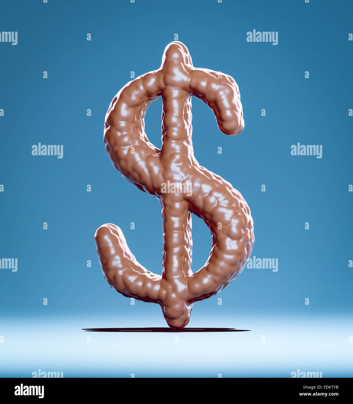 Un symbole du dollar fait de chocolat sur un fond bleu Banque D'Images