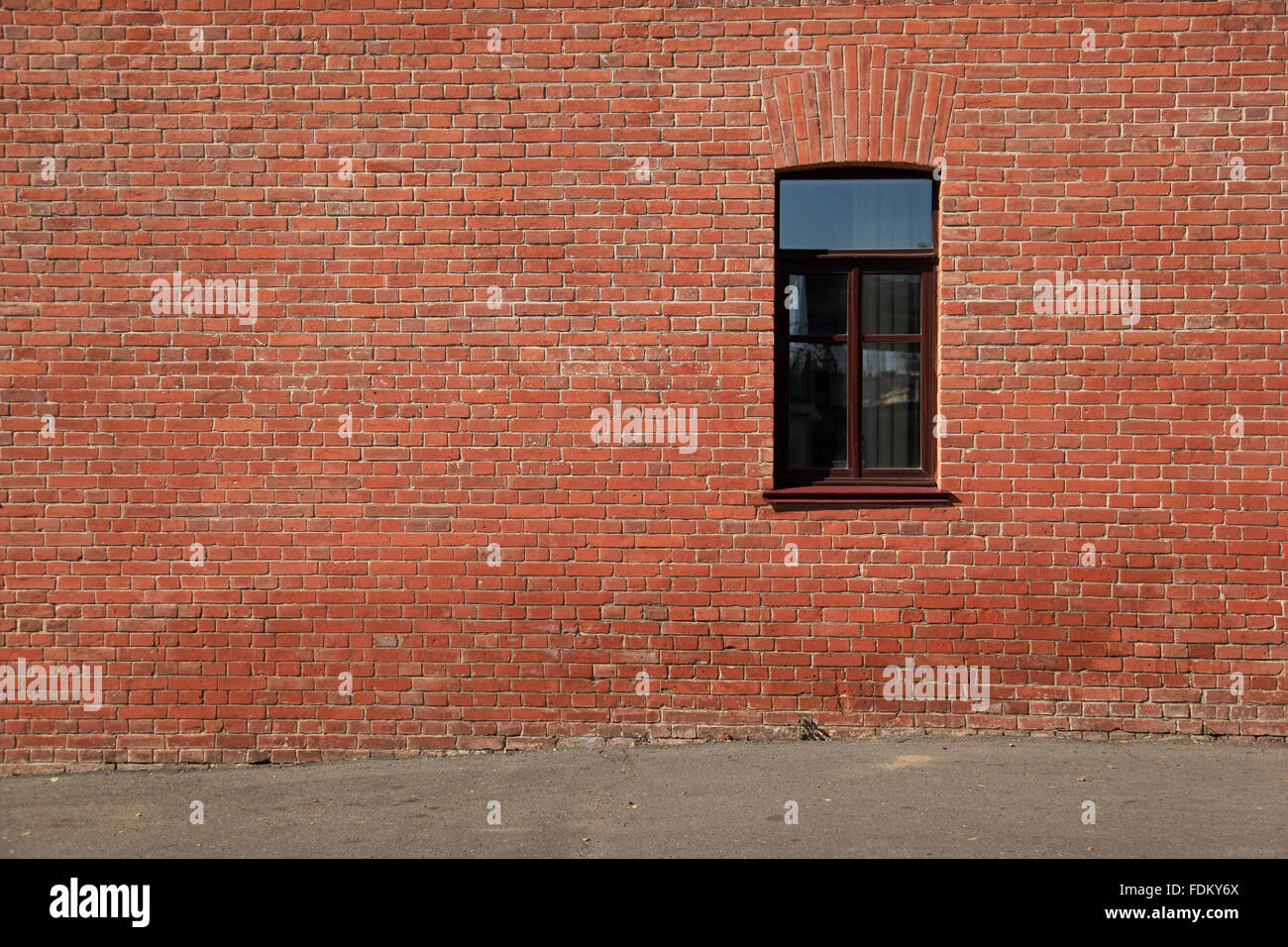 Mur de briques avec une fenêtre Banque D'Images