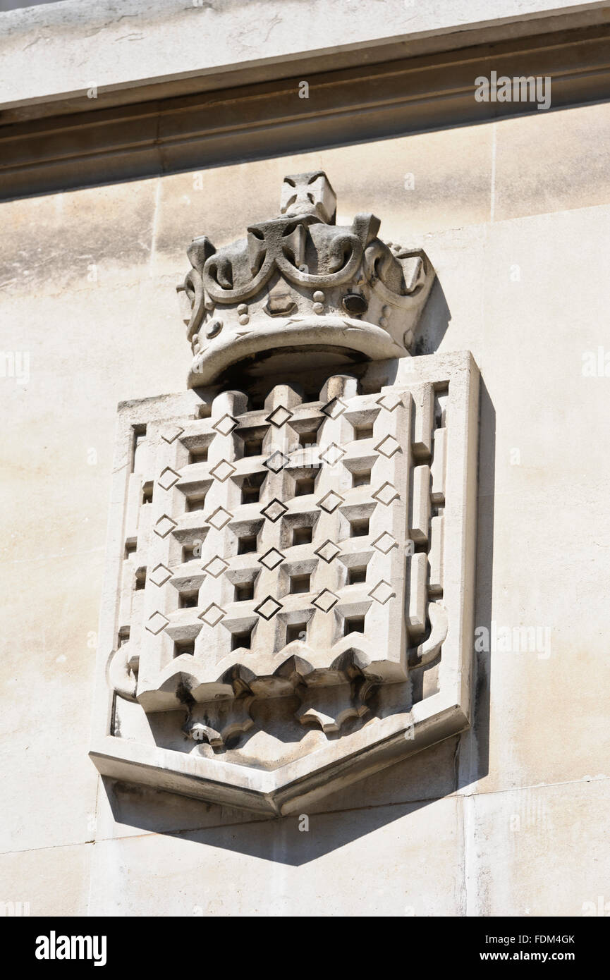 Sculptures de pierre décorative chiffres sur le ministère de l'énergie et le climat social, Londres, Royaume-Uni. Banque D'Images