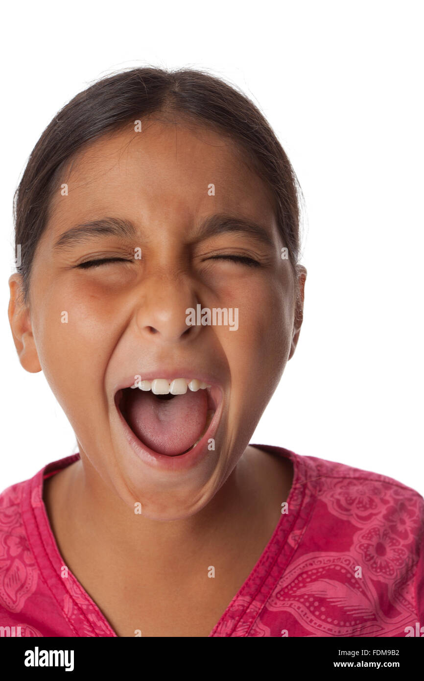 Young woman screaming loud on white background Banque D'Images