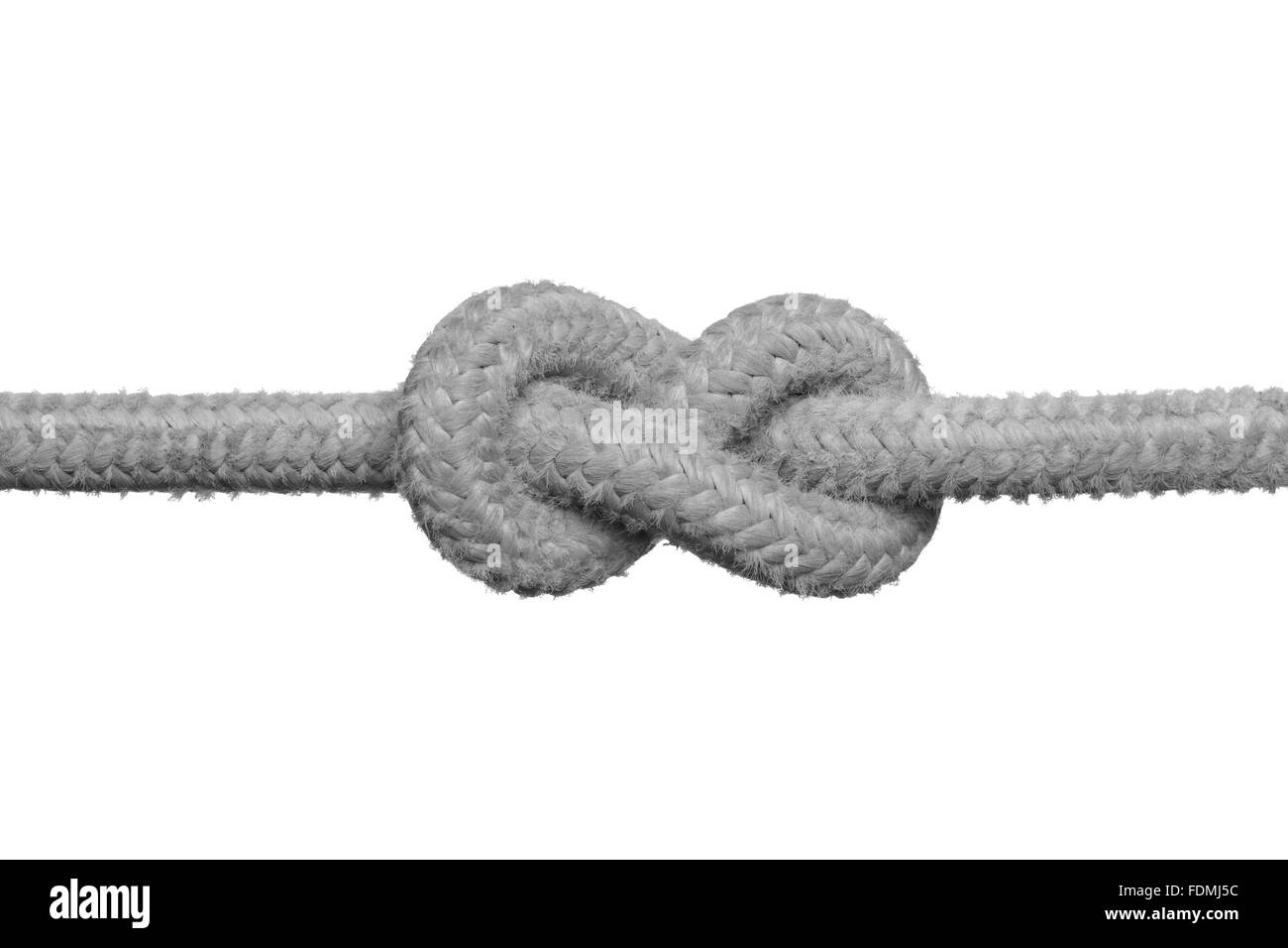 Gros noeud sur la corde (notion de problème non résolu) isolé sur le fond blanc. Banque D'Images