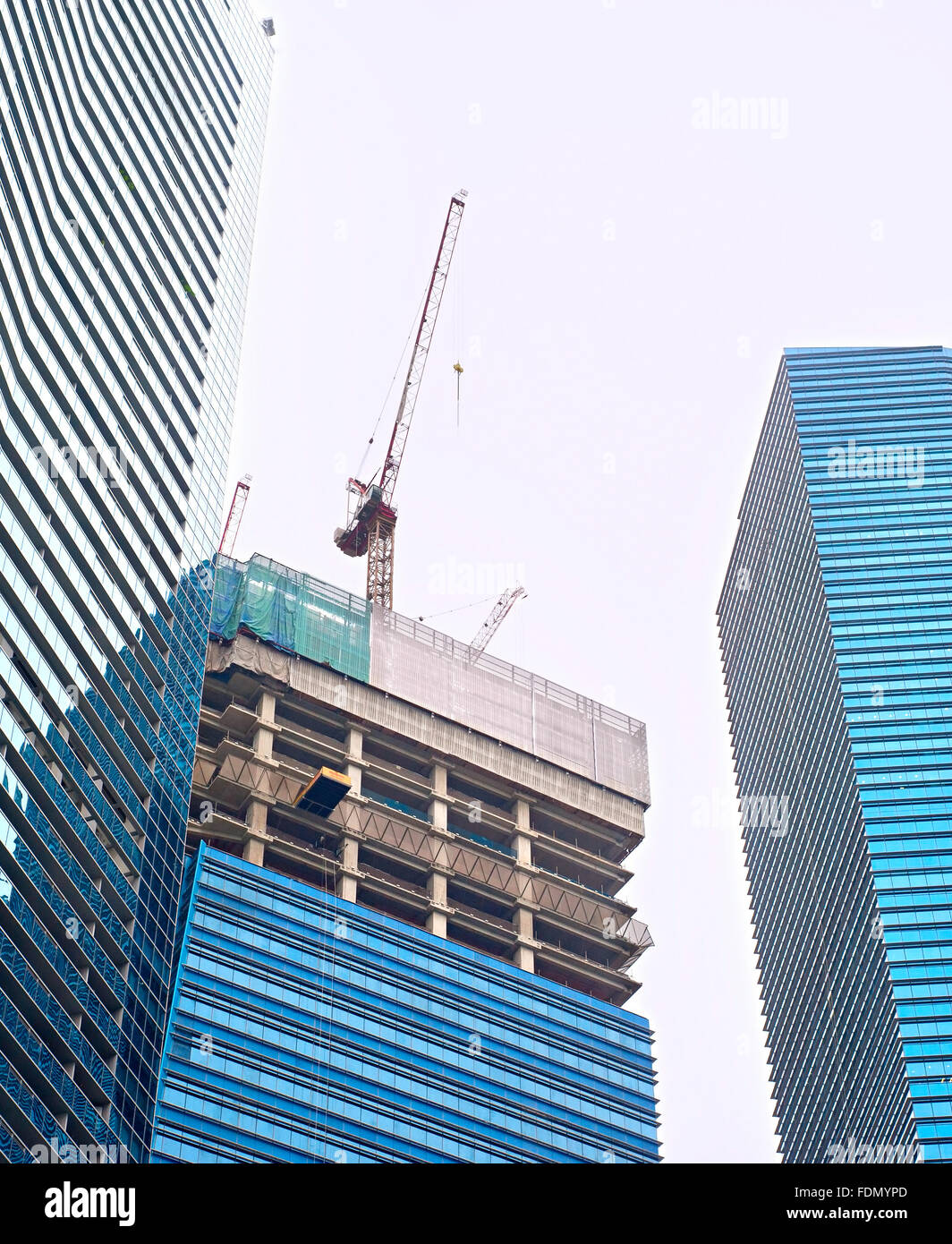 Site de construction d'un immeuble de bureaux modernes à Singapour Banque D'Images