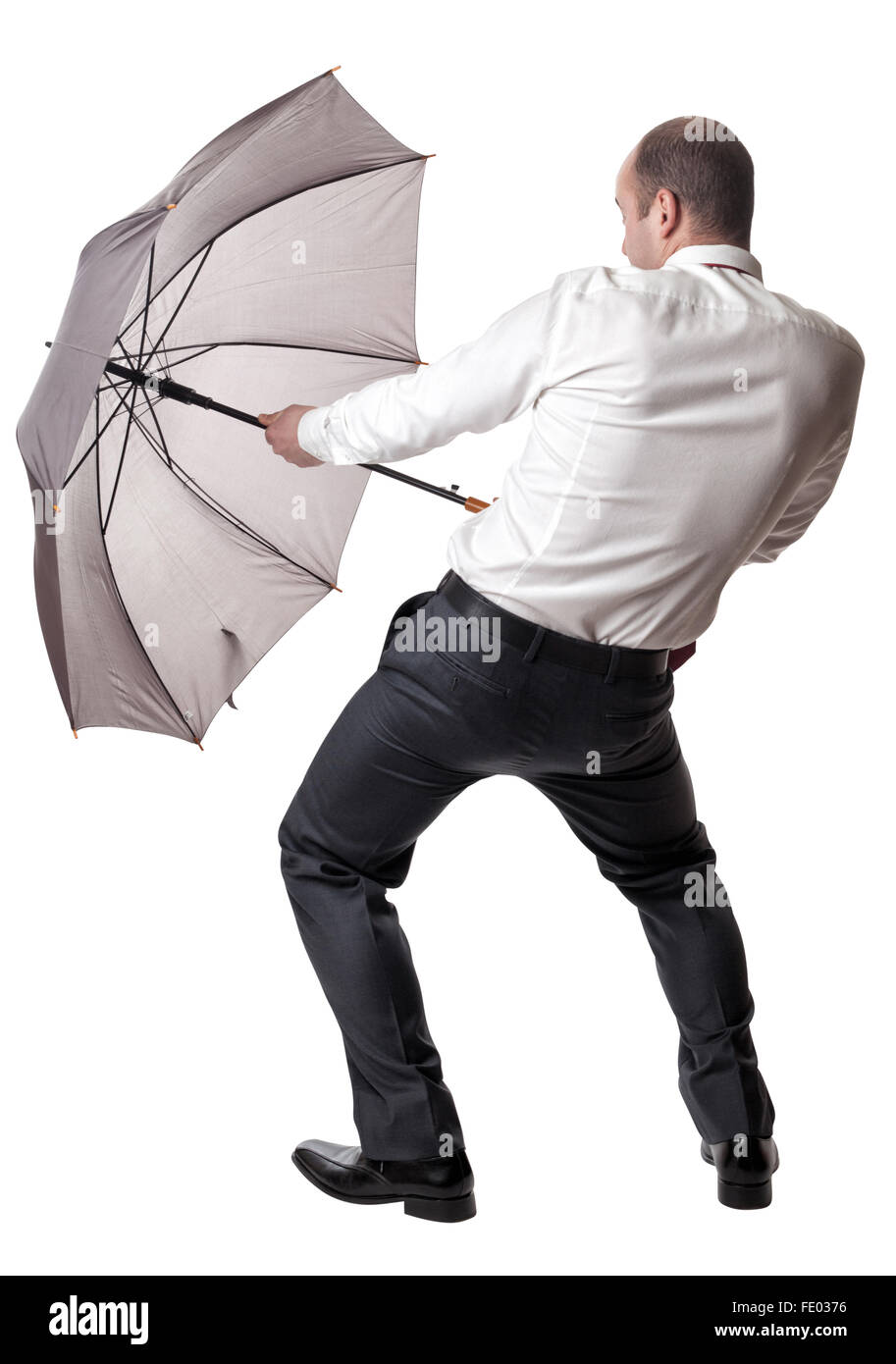 Homme avec parapluie isolé sur fond blanc Banque D'Images