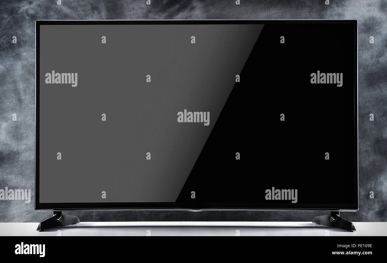 Télévision par satellite sur un fond sombre. Banque D'Images