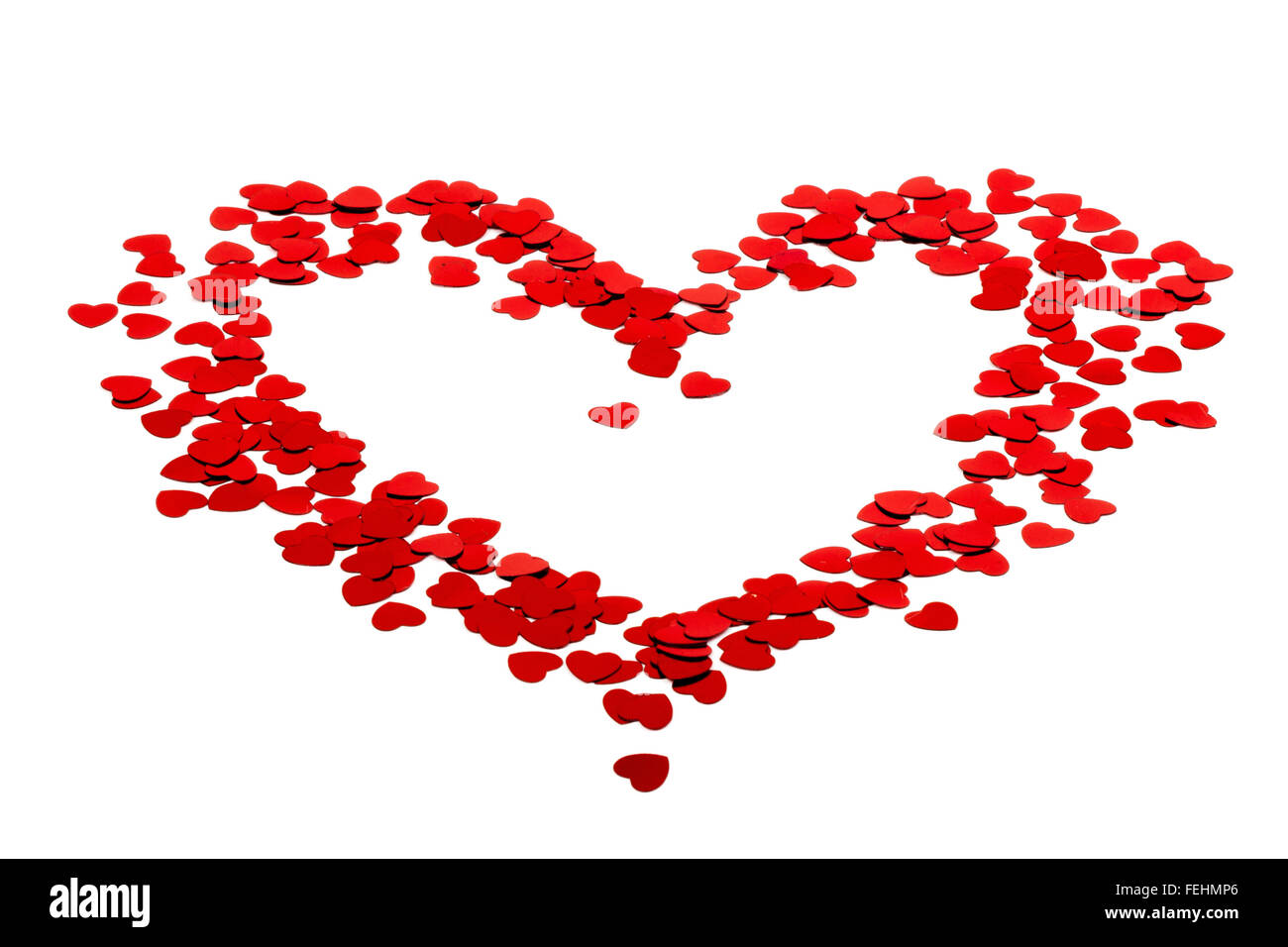 Silhouette coeur faits de confetti rouge Banque D'Images