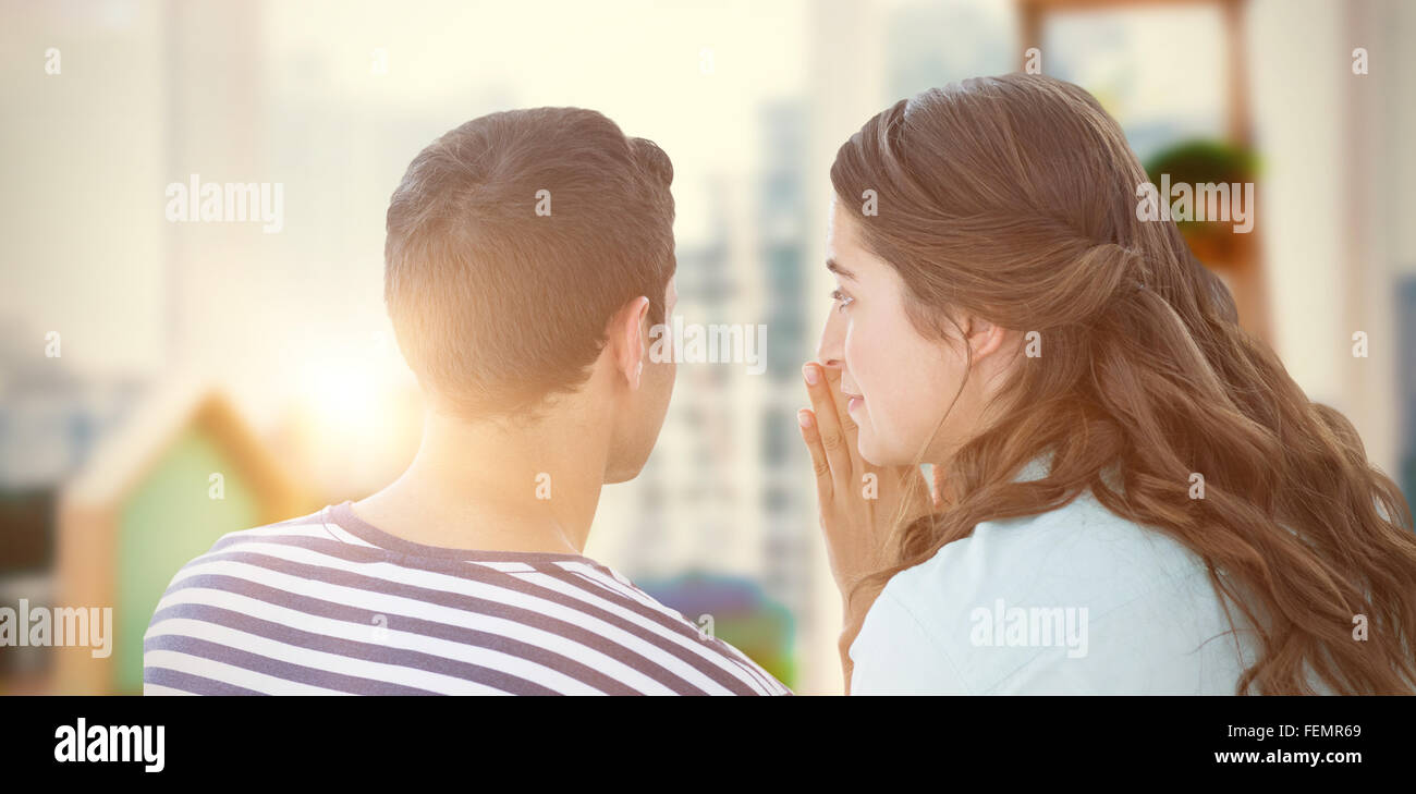 Image composite de woman whispering secret de petit ami Banque D'Images