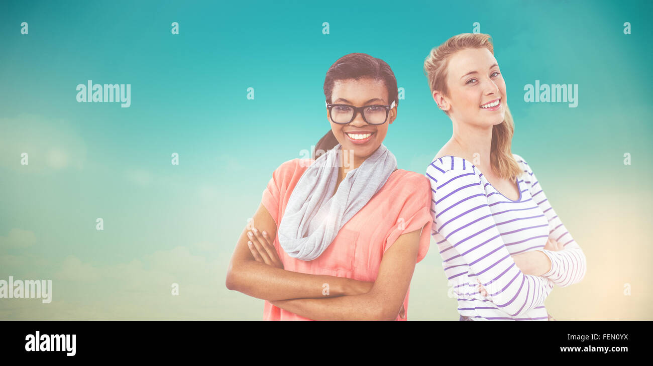 Image composite de Dame posant avec bras croisés Banque D'Images