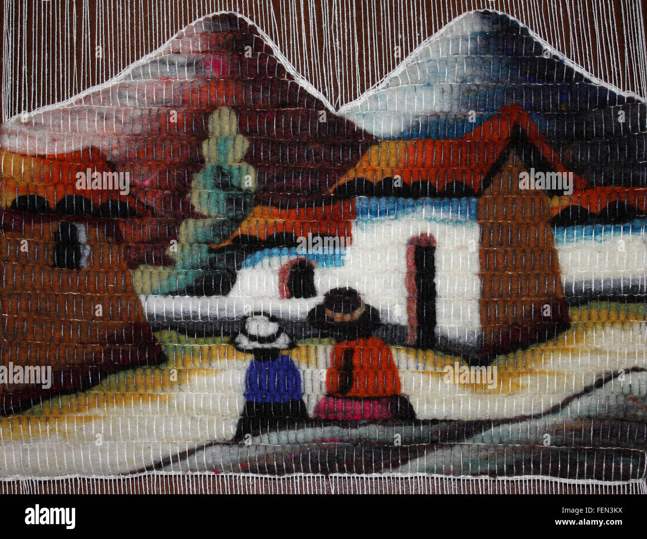 Panneau de tapisserie montrant village des Andes Banque D'Images