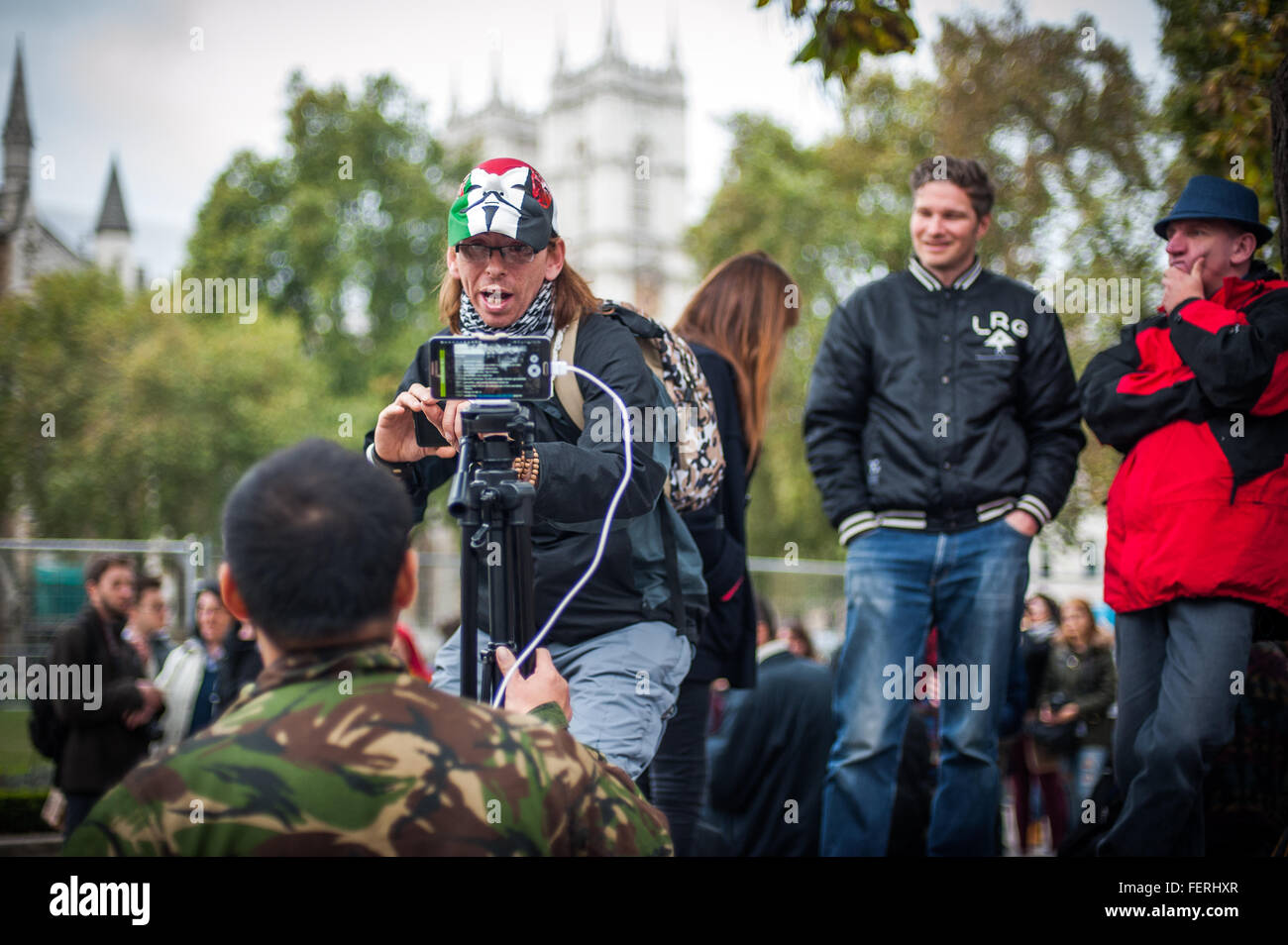 S'amuser des militants à occuper la place du Parlement, Londres Banque D'Images