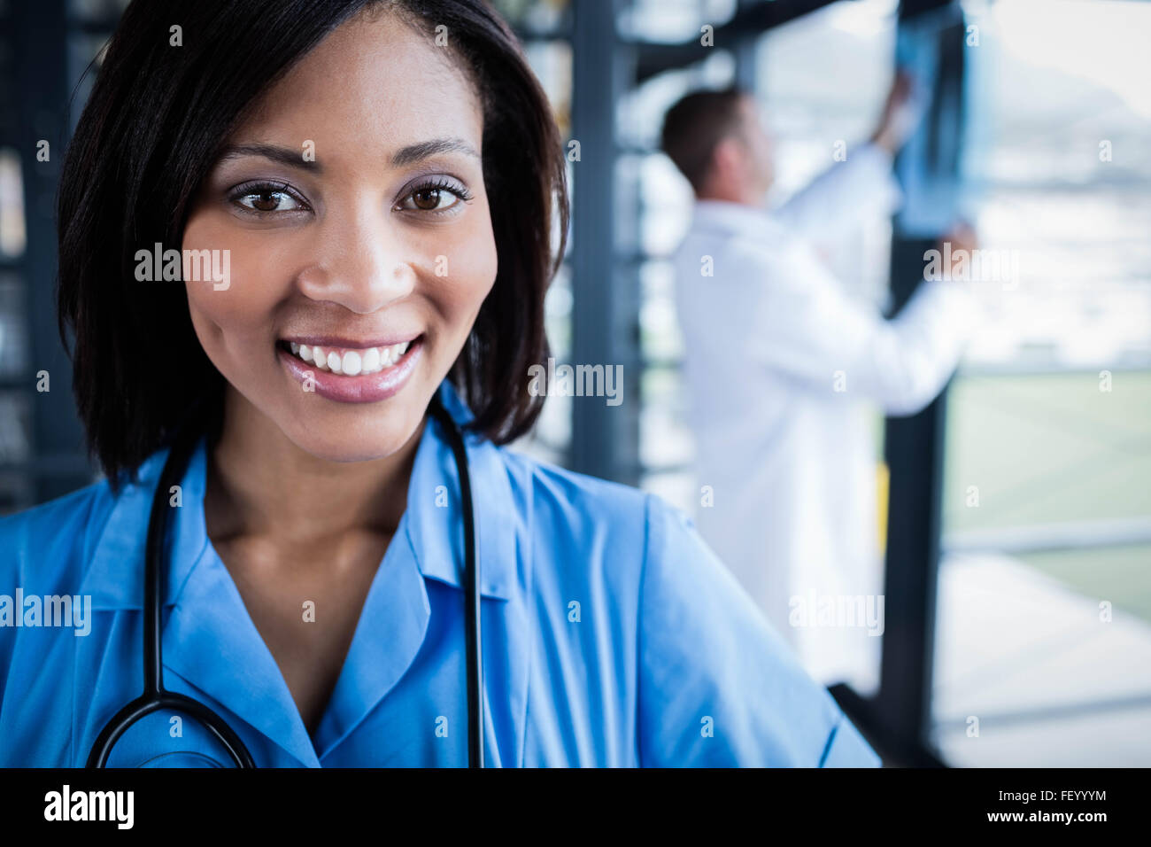 Nurse smiling at the camera Banque D'Images