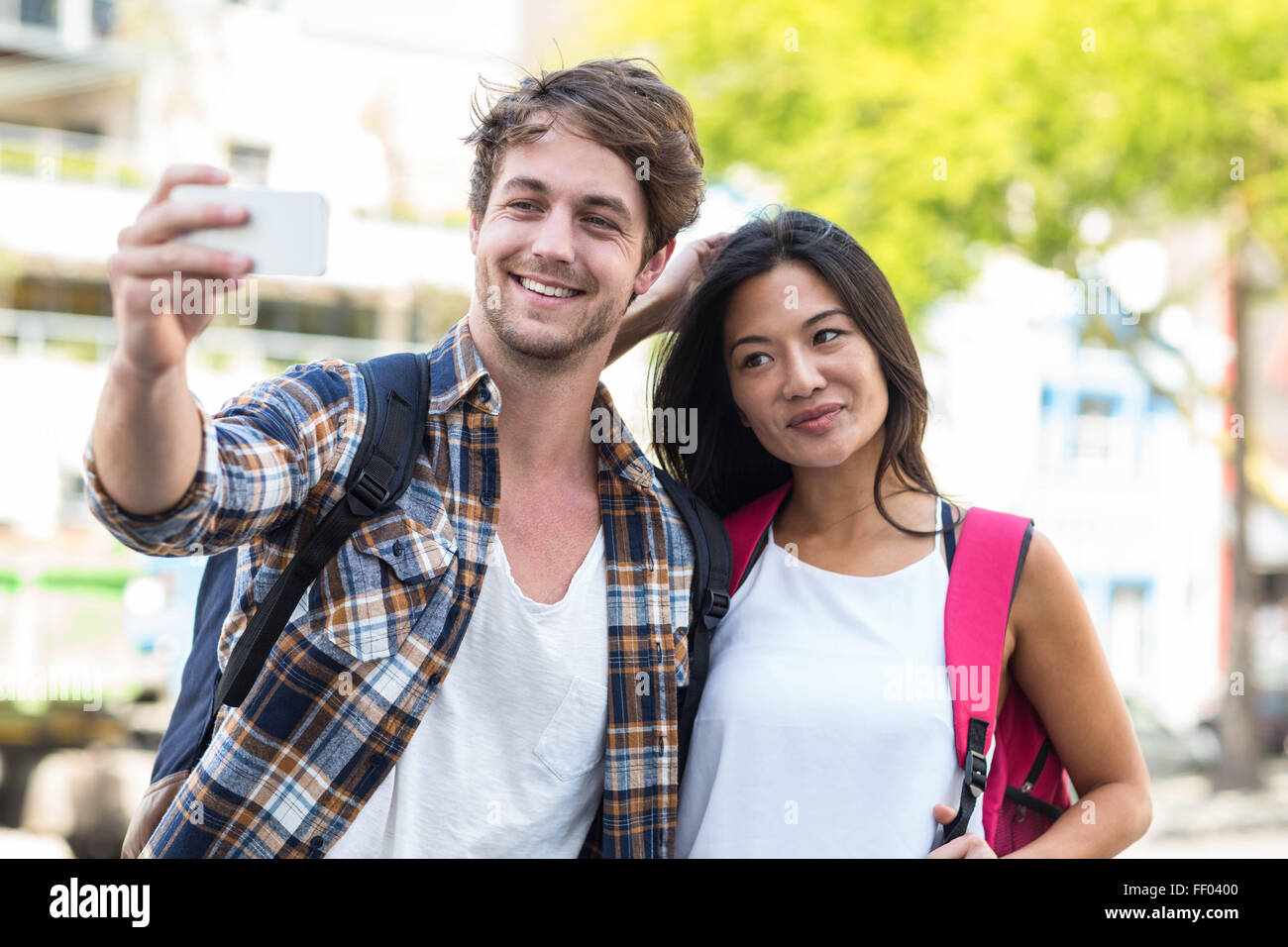 Couple de la hanche selfies Banque D'Images
