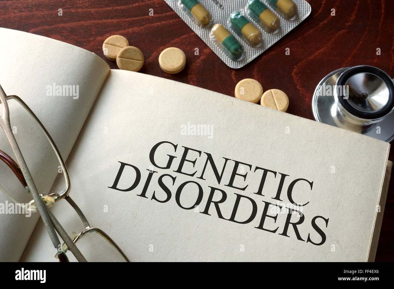 Réservez avec le diagnostic des maladies génétiques et des pilules. Concept médical. Banque D'Images