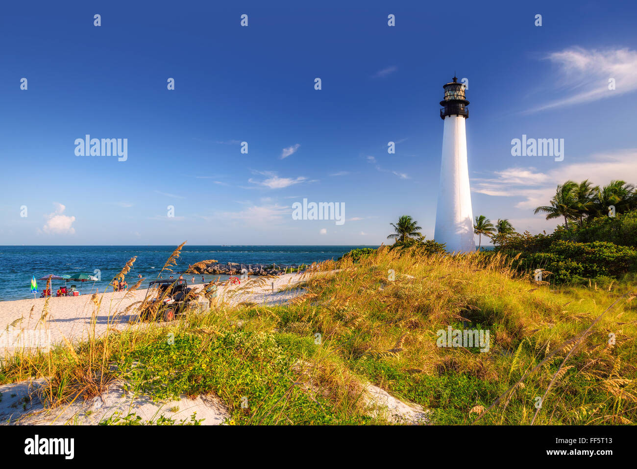 La plage et le phare de Cape Florida au coucher du soleil, Key Biscayne, Miami Banque D'Images