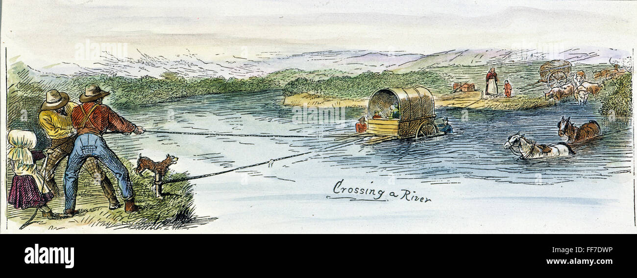 Les émigrants de l'Oregon Trail. /NCrossing une rivière : gravure couleur, 1878. Banque D'Images