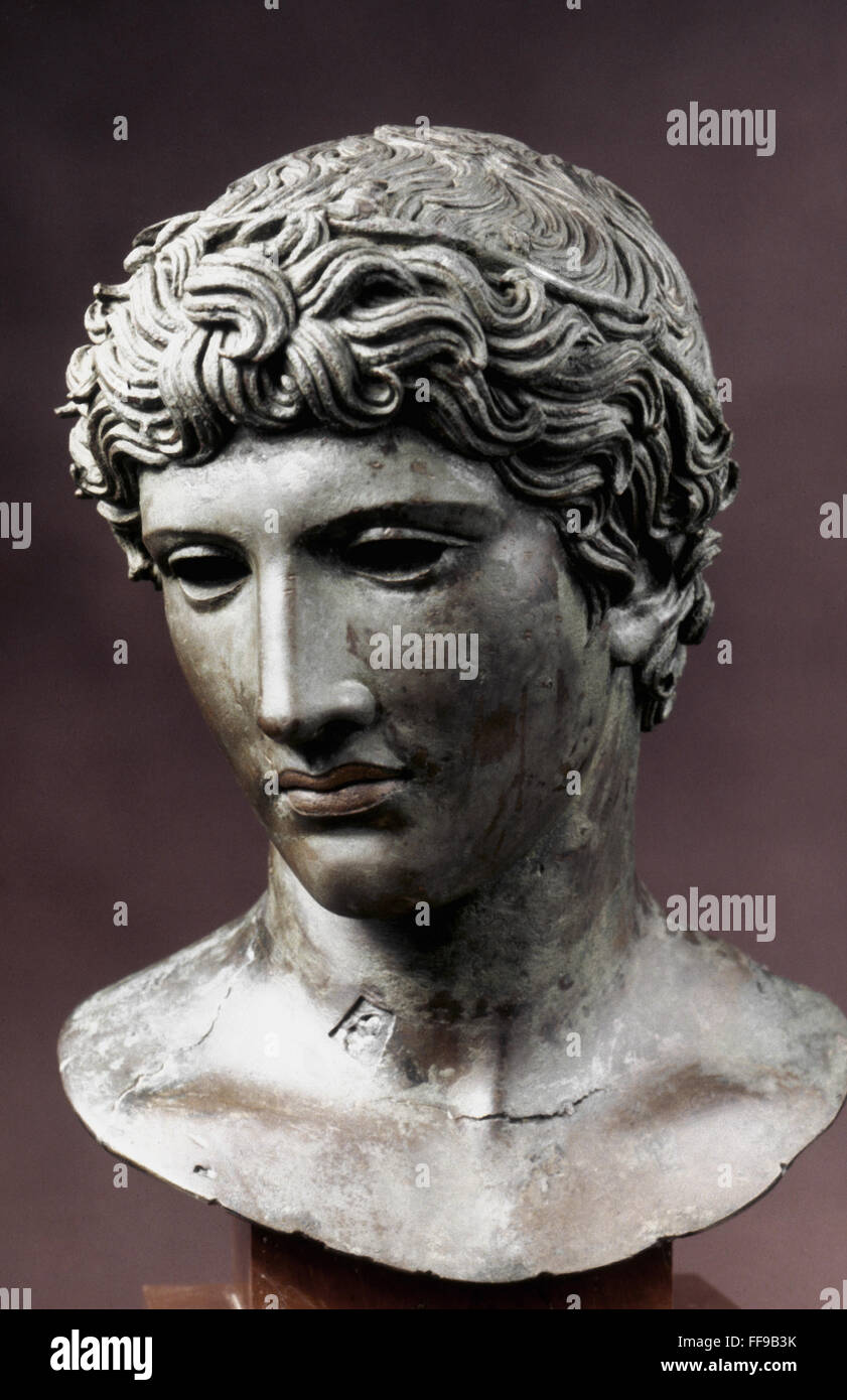 Jeune homme romain et d'un buste. /NBronze, Ier siècle avant J.-C. Banque D'Images