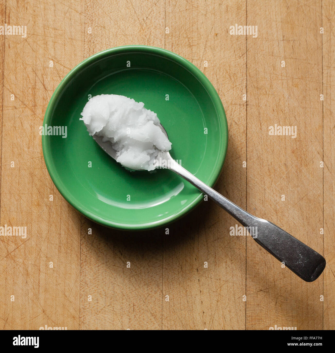 L'huile de noix de coco sur spoon Banque D'Images