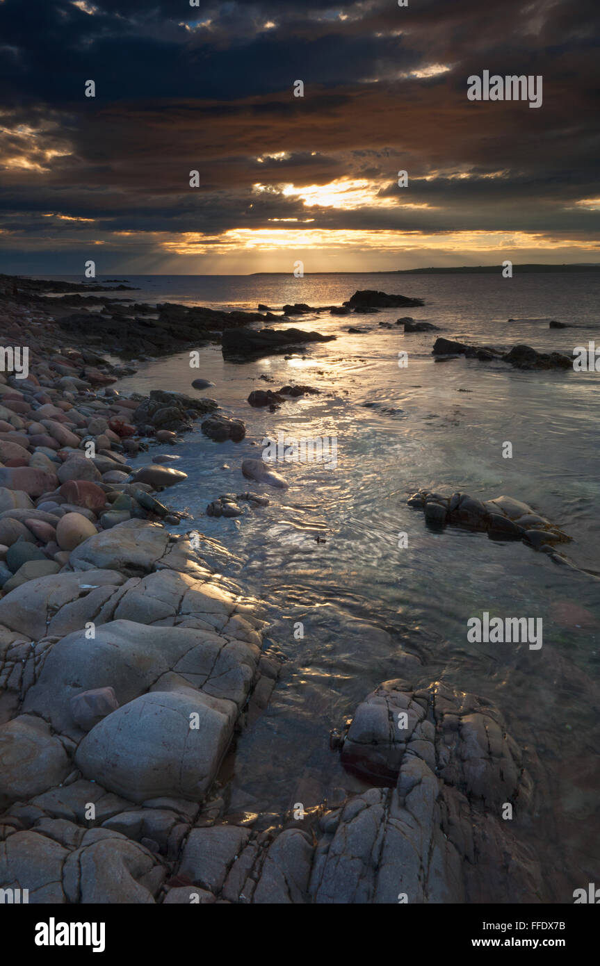 Coucher de soleil sur les Pentland Firth de John O'Groats - au milieu de l'Ecosse Caithness,. Banque D'Images