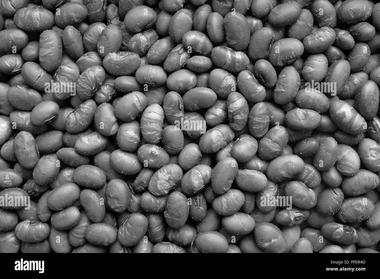 Noix de soja salée rôti comme un abstract background texture - traitement monochrome Banque D'Images