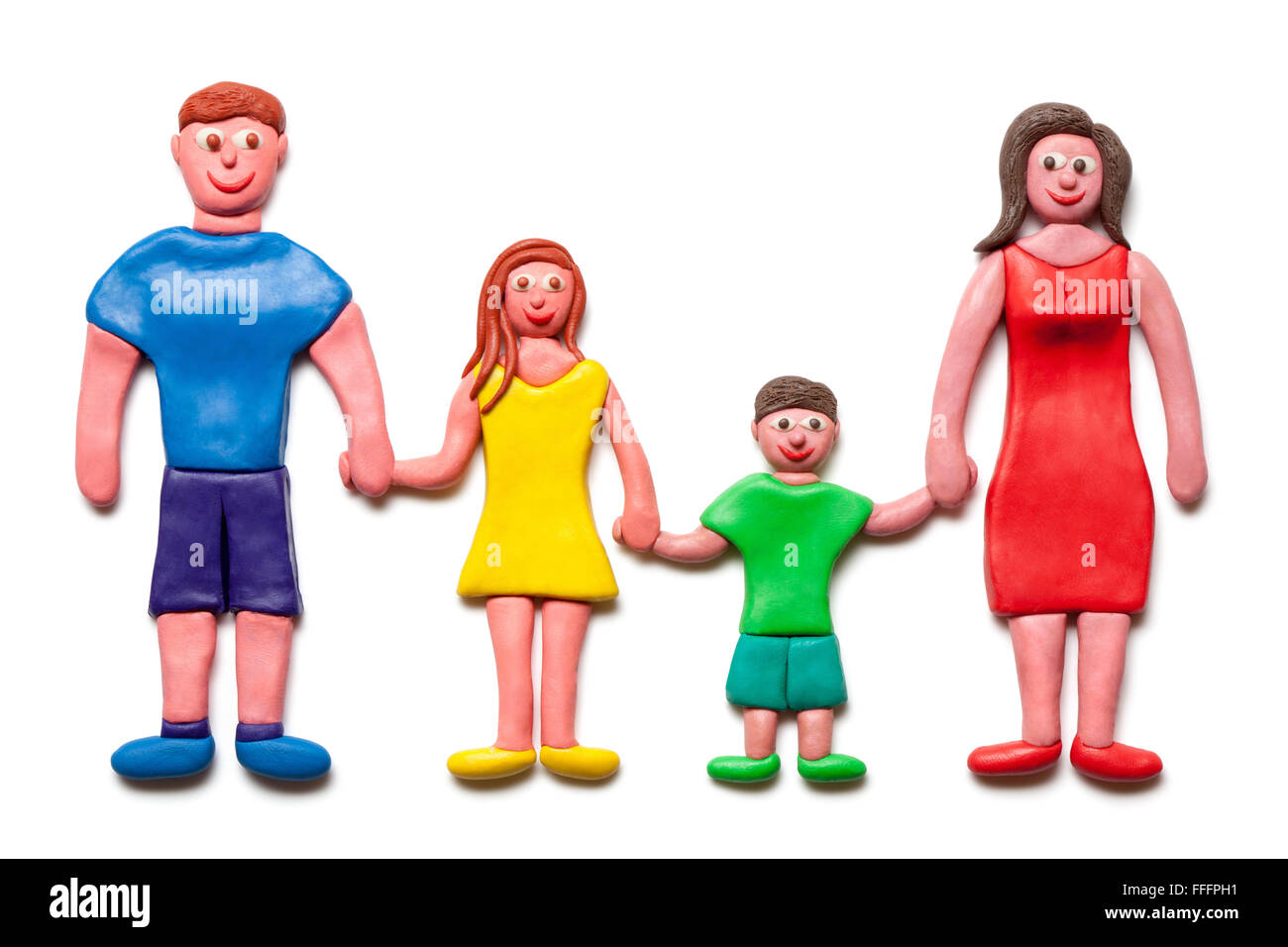 Ma famille heureuse isolé sur le fond blanc.(Pâte à modeler. Chemin de détourage inclus.) Banque D'Images