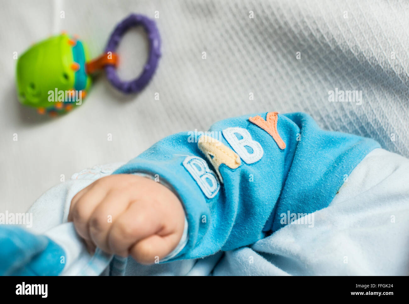 La main de bébé Bébé texte ADN. Banque D'Images