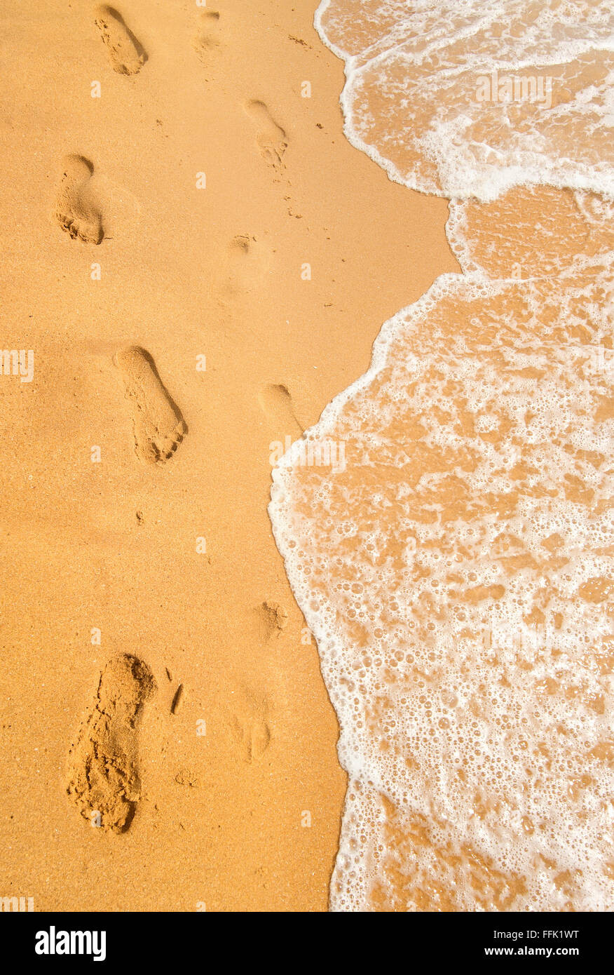 Fond de plage de sable fin et des vagues de l'océan Banque D'Images