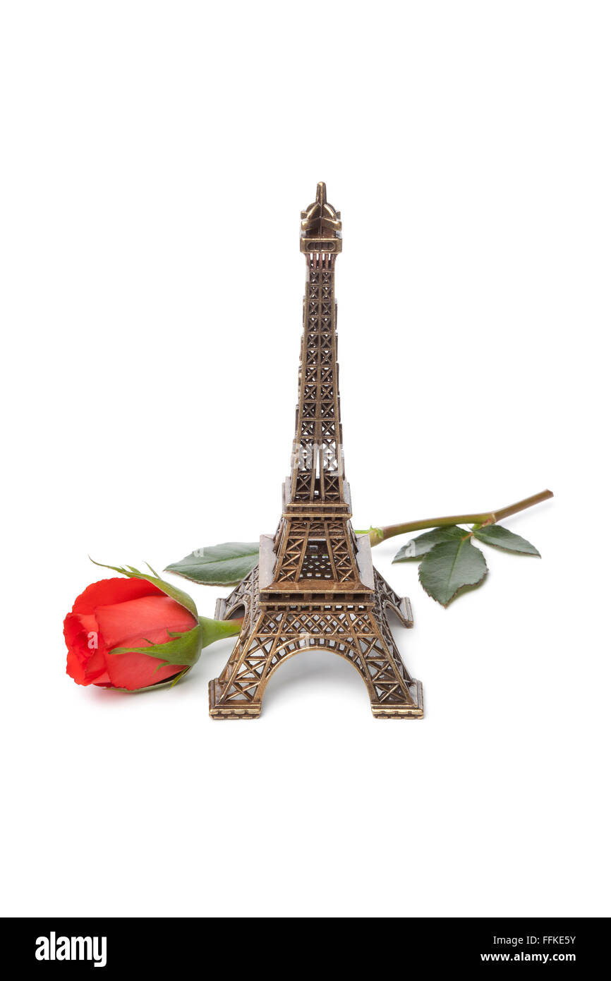 Souvenir de la tour Eiffel avec une rose rouge sur fond blanc Banque D'Images