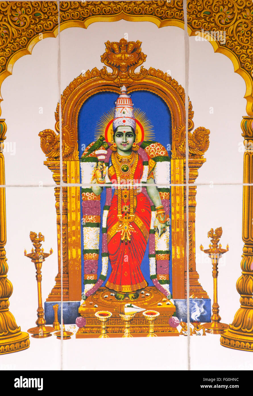 Sri Meenakshi Amman déesse Parvati peintes de couleurs vives sur fond blanc carreaux émaillés fixés au mur Banque D'Images