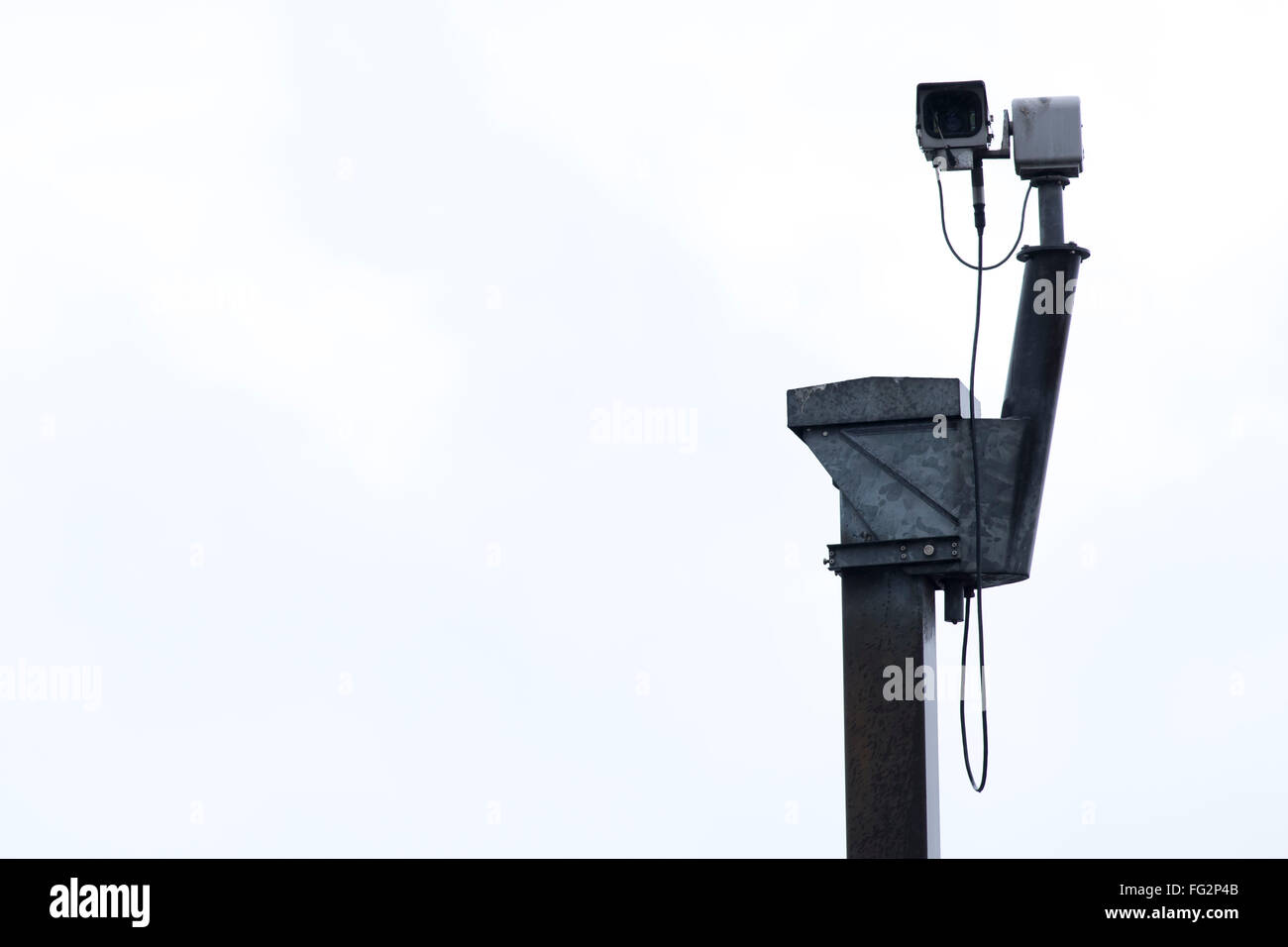 Caméra de sécurité CCTV contre un arrière-plan. Banque D'Images