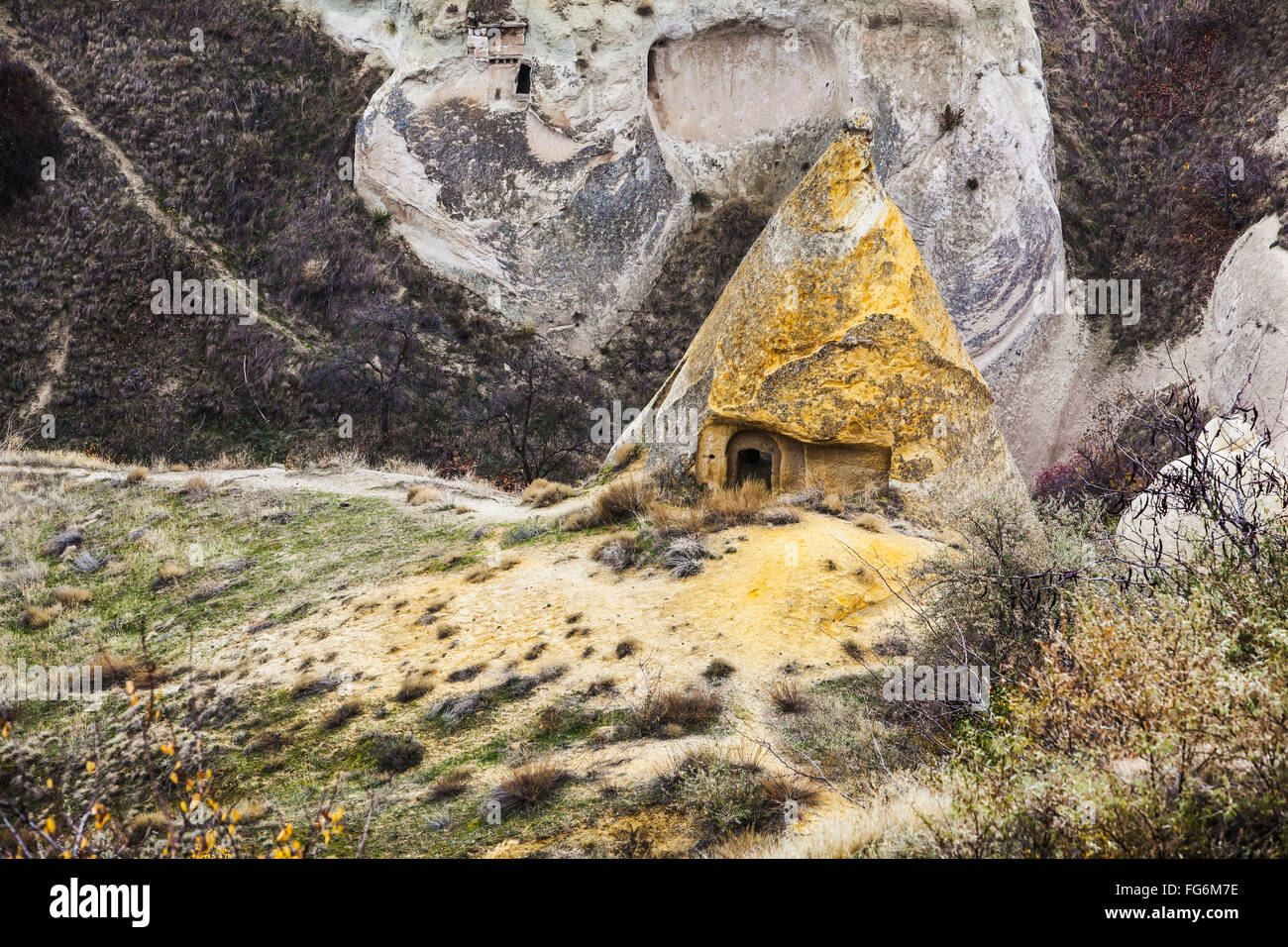 Logements en cheminées de fées : Goreme, Cappadoce, Turquie Banque D'Images