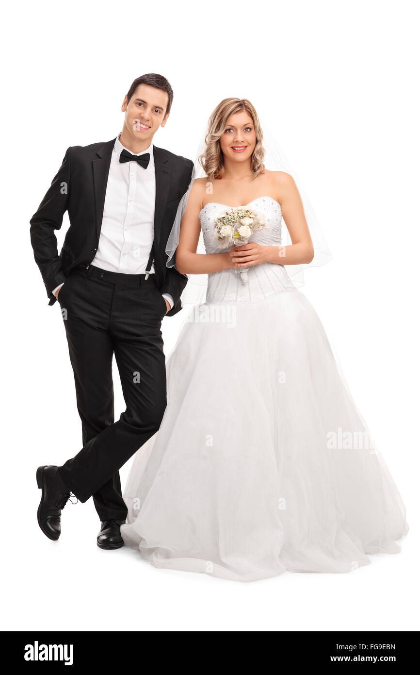 Portrait d'un jeune couple posing together isolé sur fond blanc Banque D'Images